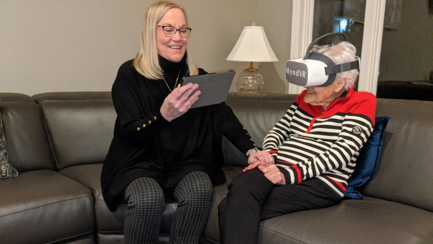 A participant uses his MyndVR headset to go on a virtual fishing trip.