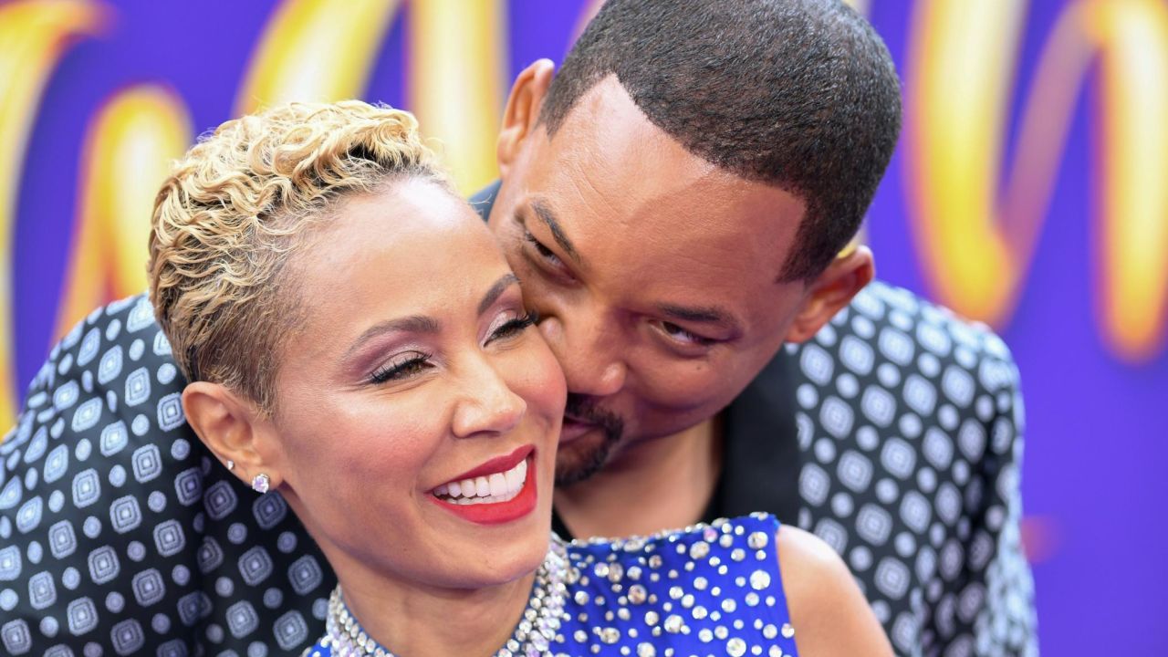Will Smith and his wife, actress Jada Pinkett Smith, snuggle at a premiere in Hollywood in May 2019. 