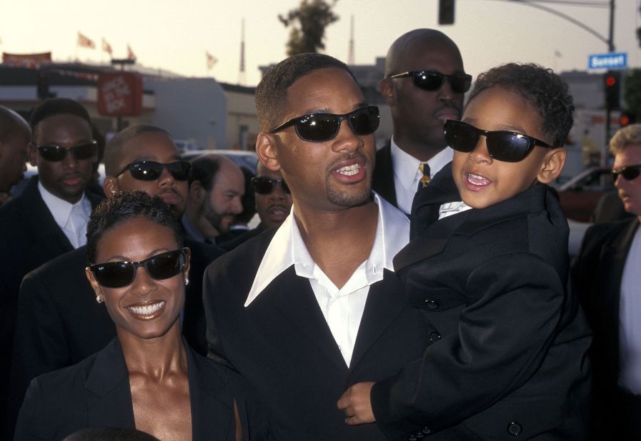 Will holds his son Trey at the "Men in Black" premiere in June 1997. Trey is Will's son from his first marriage.