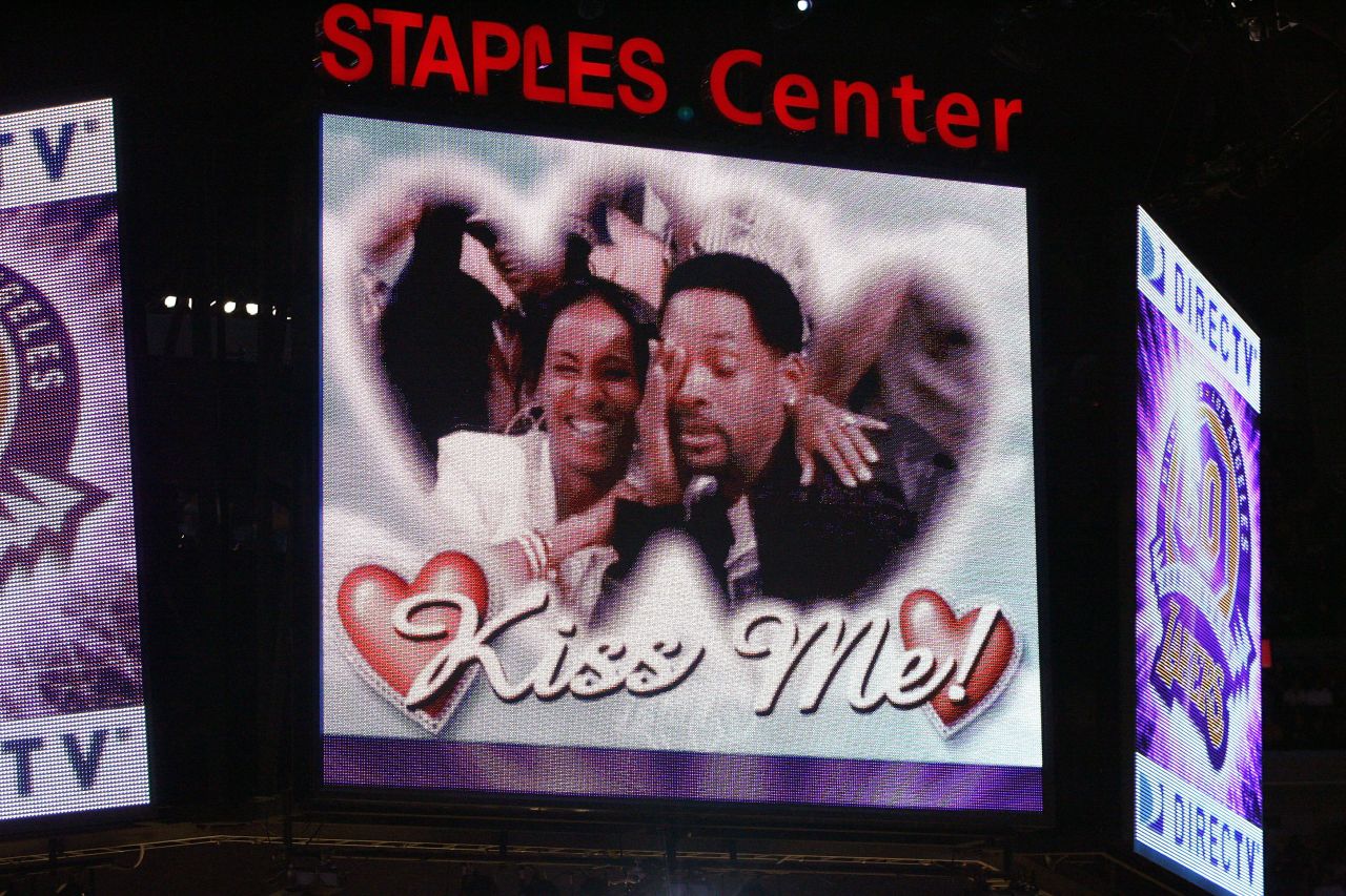 The couple is shown on the "kiss cam" as they attend the NBA Finals in June 2008.