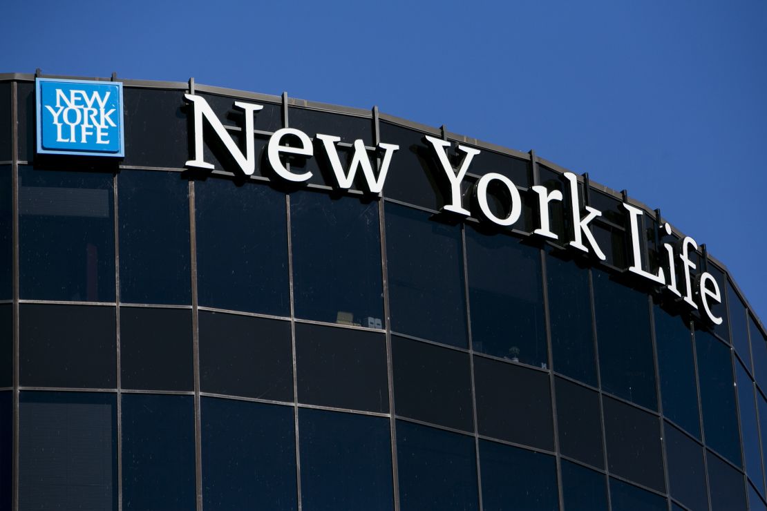 A logo sign outside of a New York Life Insurance Company building.