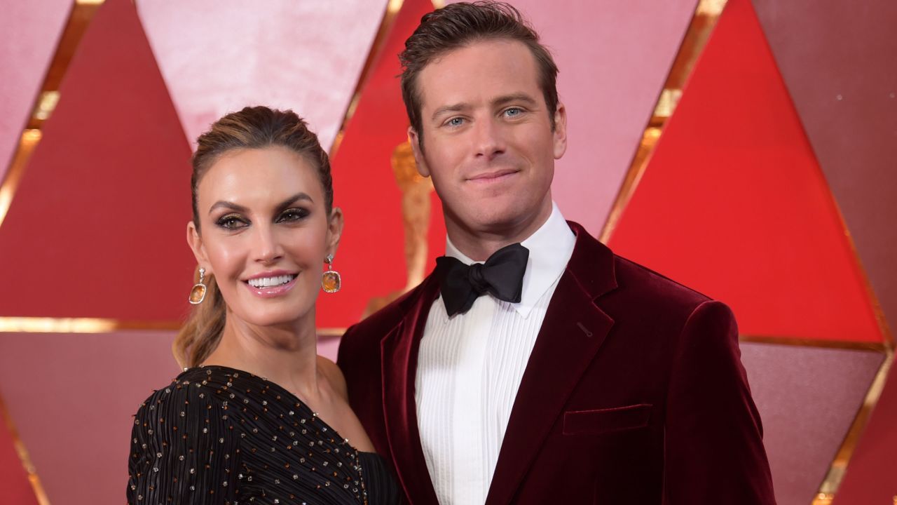 Elizabeth Chambers and Armie Hammer arrive at the Oscars in March 2018 in Los Angeles. 
