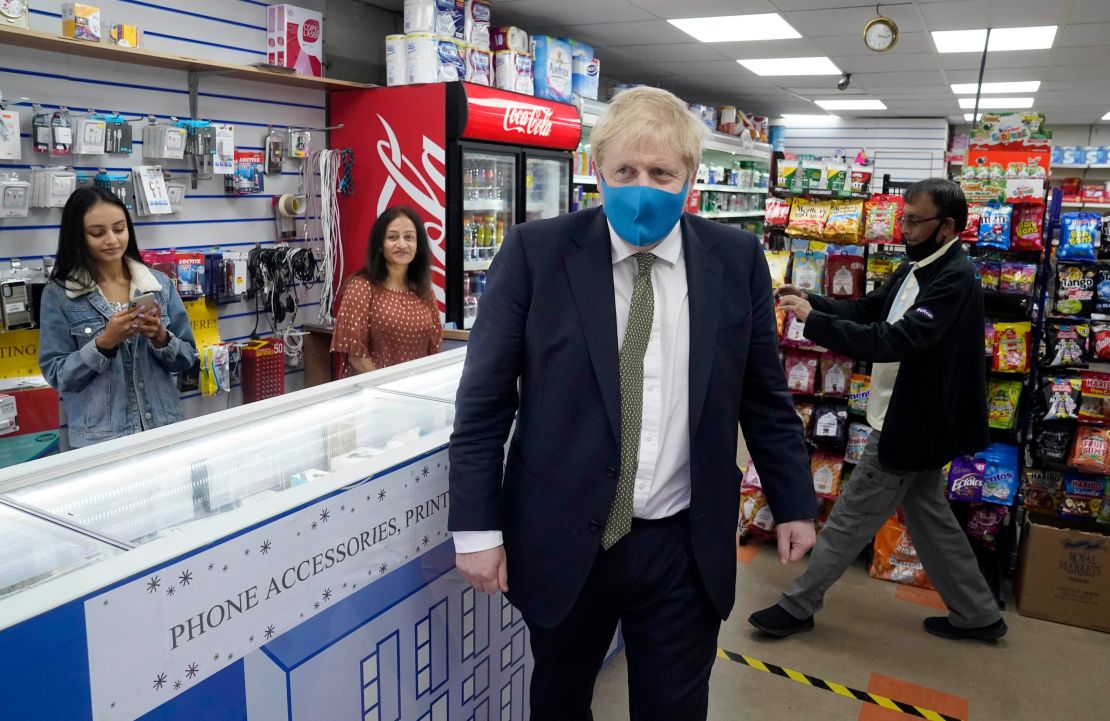 The PM wore a mask for the first time in public on Friday, in his Uxbridge constituency, west of London.