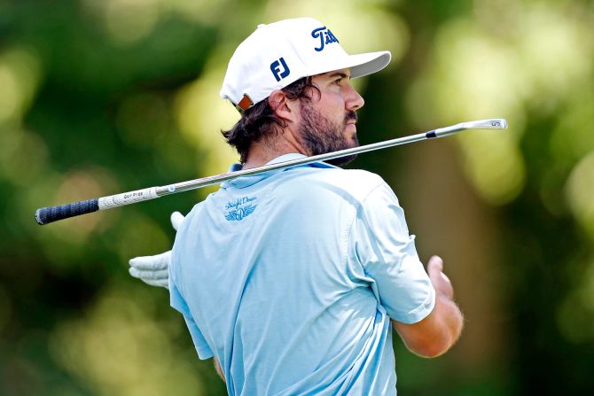 Mark Hubbard drops his club after playing a shot during the final round of the Rocket Mortgage Classic golf tournament at Detroit Golf Club in Detroit, Michigan, on July 5.
