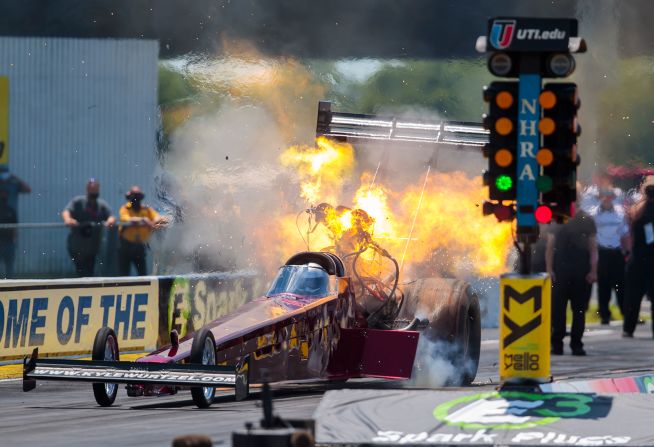 NHRA top fuel driver Kyle Wurtzel has an engine explode during qualifying for the E3 Spark Plugs Nationals at Lucas Oil Raceway in Clermont, Indiana, on July 11.