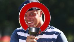 DETROIT, MICHIGAN - JULY 05: Bryson DeChambeau of the United States celebrates with the trophy after winning during the final round of the Rocket Mortgage Classic on July 05, 2020 at the Detroit Golf Club in Detroit, Michigan. (Photo by Gregory Shamus/Getty Images)