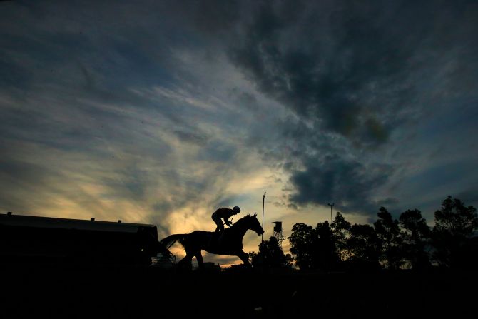 Jockey Tim Clark rides Tony's Reward across the finish line during a horse race at Rosehill Gardens in Sydney, Australia, on July 11.