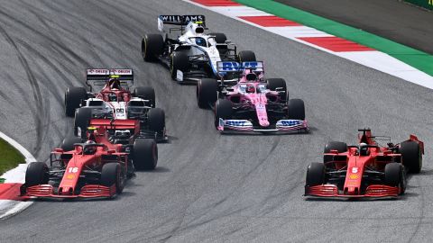 Vettel (right) and Leclerc (left) drive after colliding. 