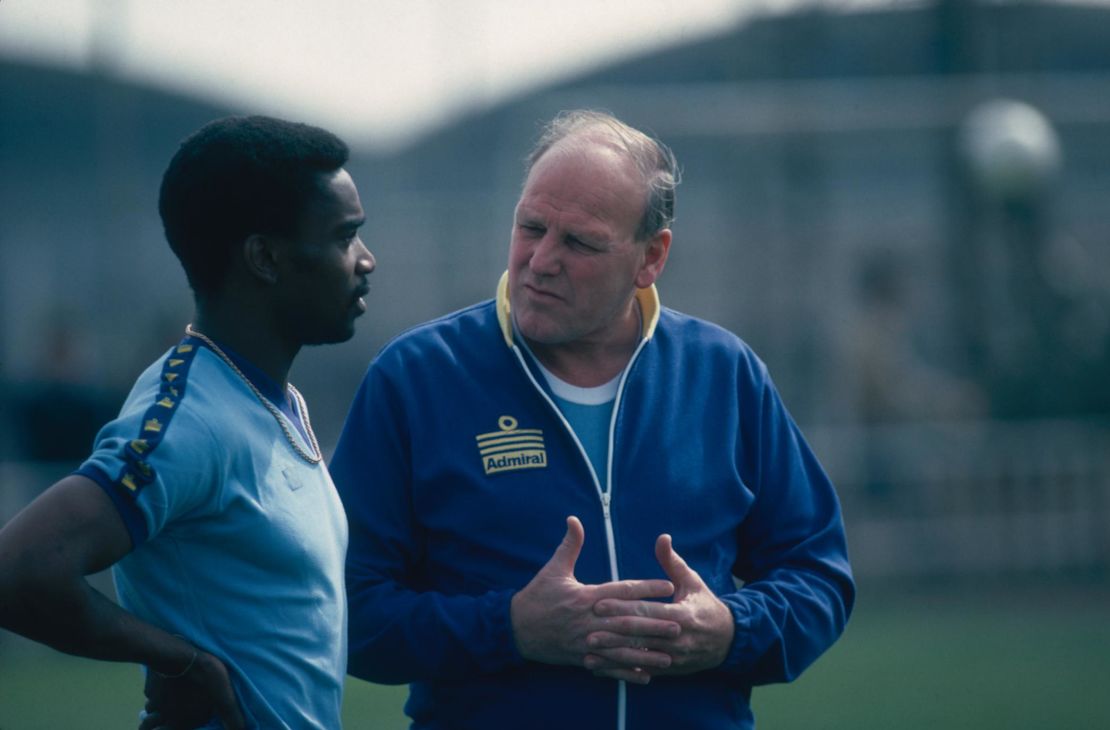 England manager Ron Greenwood speaks to Laurie Cunningham during training.