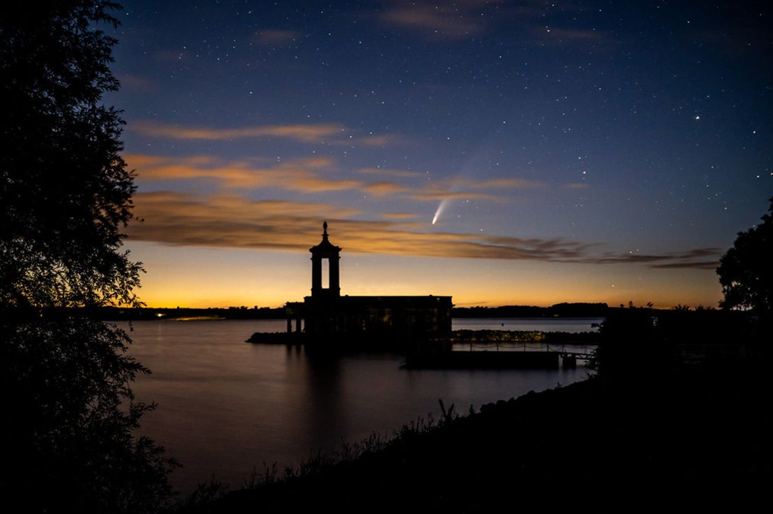 A picture of the comet taken at Rutland Water Park, England, on Saturday. 