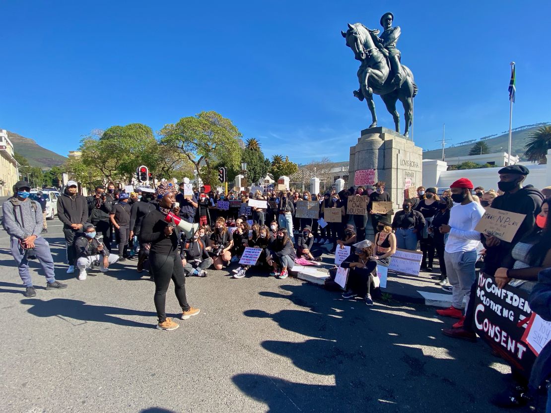 Activists protest against gender-based violence in South Africa, at a rally outside parliament in Cape Town.