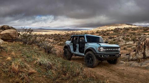 The 2021 Ford Bronco seen here with the Sasquatch off-road package and its roof and doors taken off.