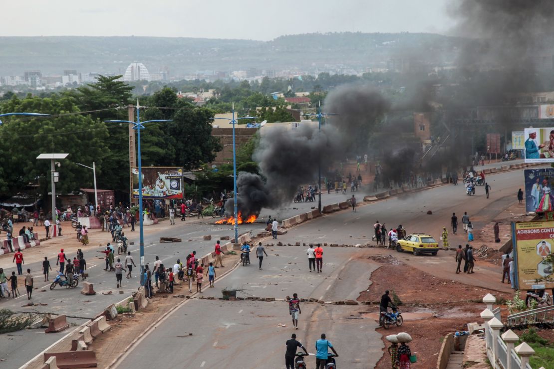 Protesters burn tires and barricade roads in the capital Bamako on Friday.