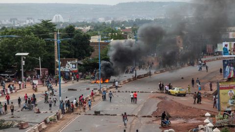 Protesters burn tires and barricade roads in the capital Bamako on Friday.