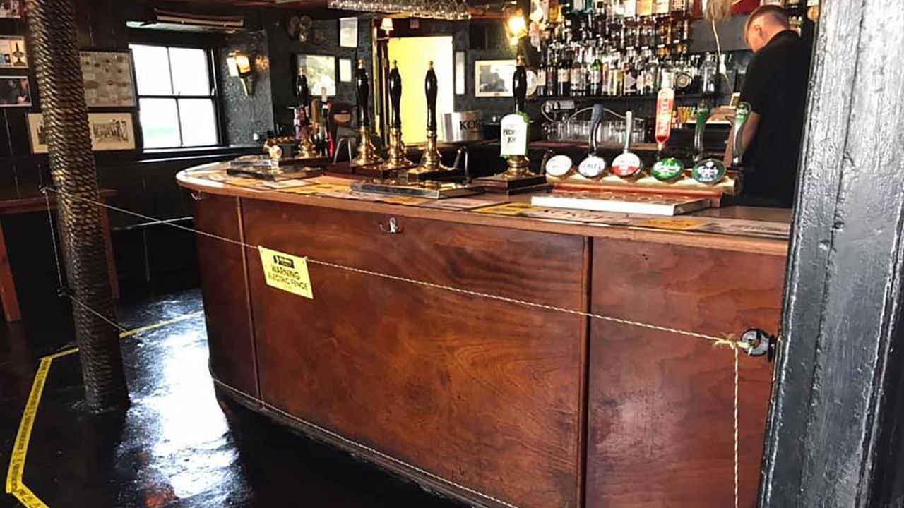 Jonny McFadden, who runs the Star Inn in St Just, Cornwall, told CNN he installed the electric fence in front of his bar for social distancing purposes.