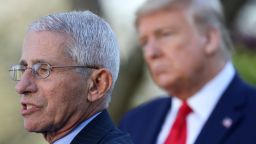 National Institute of Allergy and Infectious Diseases Director Anthony Fauci (L) speaks as U.S. President Donald Trump listens during the daily coronavirus briefing at the Rose Garden of the White House on March 30, 2020 in Washington, DC. 