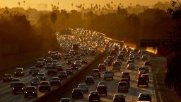 Heavy traffic clogs the 101 Freeway as people leave work for the Labor Day holiday in Los Angeles on August 29, 2014.  A Labor Day travel prediction by the American Auto Association (AAA) expects that 34.7 million Americans will journey 50 miles or more from home during the Labor Day holiday weekend, mainly due to lower gas prices and a rebounding economy.             AFP PHOTO/Mark RALSTON        (Photo credit should read MARK RALSTON/AFP via Getty Images)