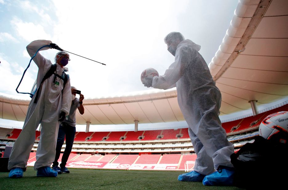 Soccer balls are sanitized before a preseason tournament in Guadalajara, Mexico, on July 12. The pro tournament was being played without spectators.