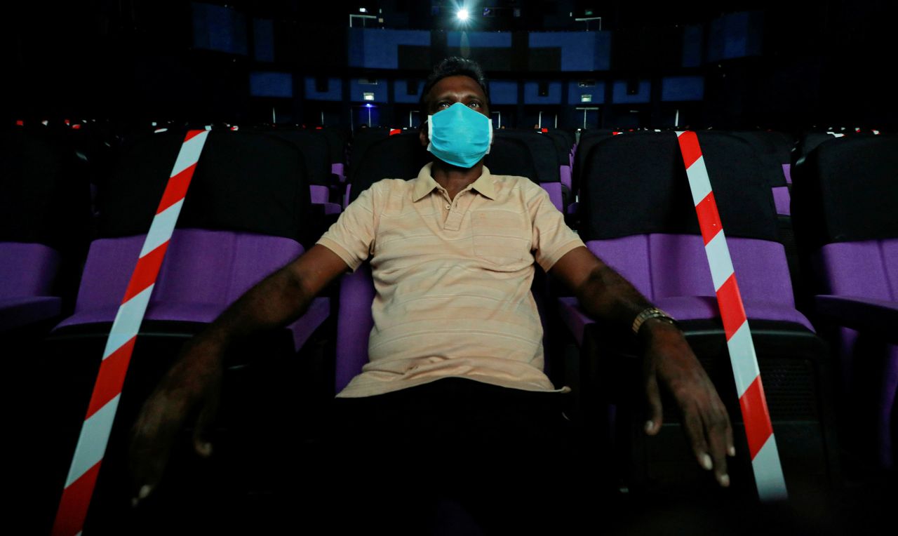 A man watches a movie at a cinema in Colombo, Sri Lanka, on July 11.