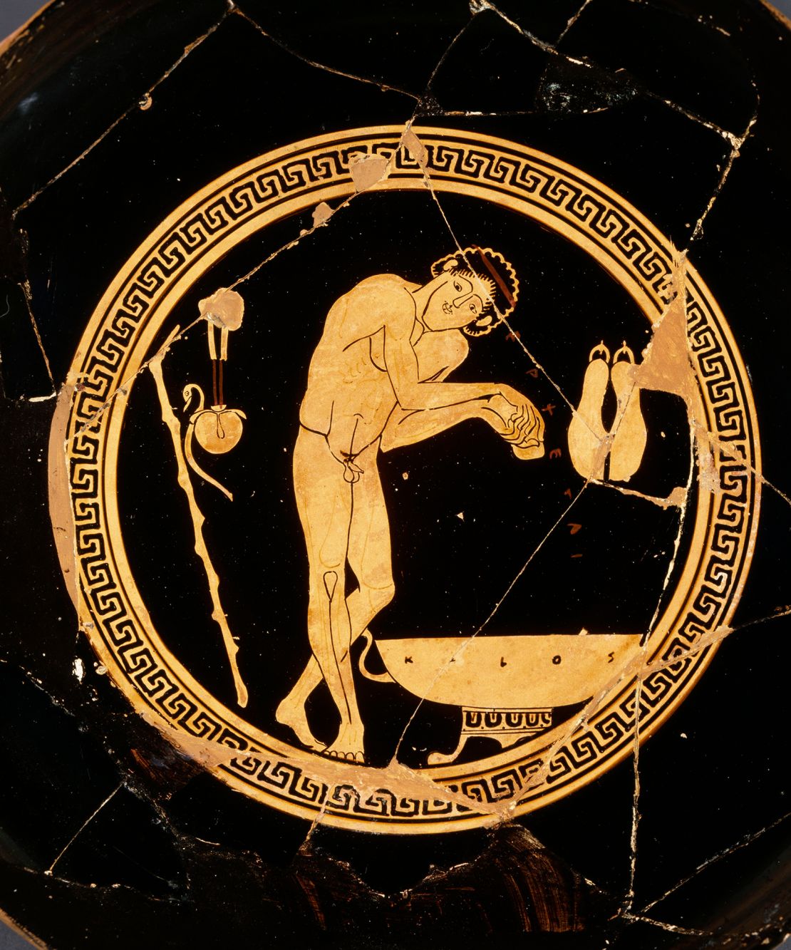 A detail of a pottery work attributed to Athenian vase painter Onesimos circa 500 BC. It shows the routines of Ancient Greek athletes, who applied oils before training in the sun, followed by bathing and vigorous scraping with a strigil tool.
