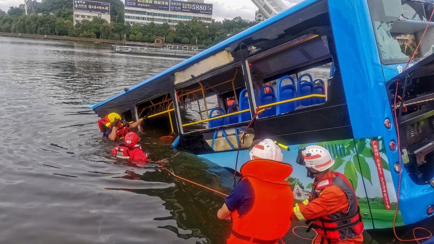 TOPSHOT - Rescuers work after a bus plunged into a lake in Anshun in China's southwestern Guizhou province on July 7, 2020. - At least 21 people were killed when a bus carrying students to their annual college entrance exam plunged into a lake in southwest China on July 7, authorities and state media said. (Photo by STR / AFP) / China OUT (Photo by STR/AFP via Getty Images)
