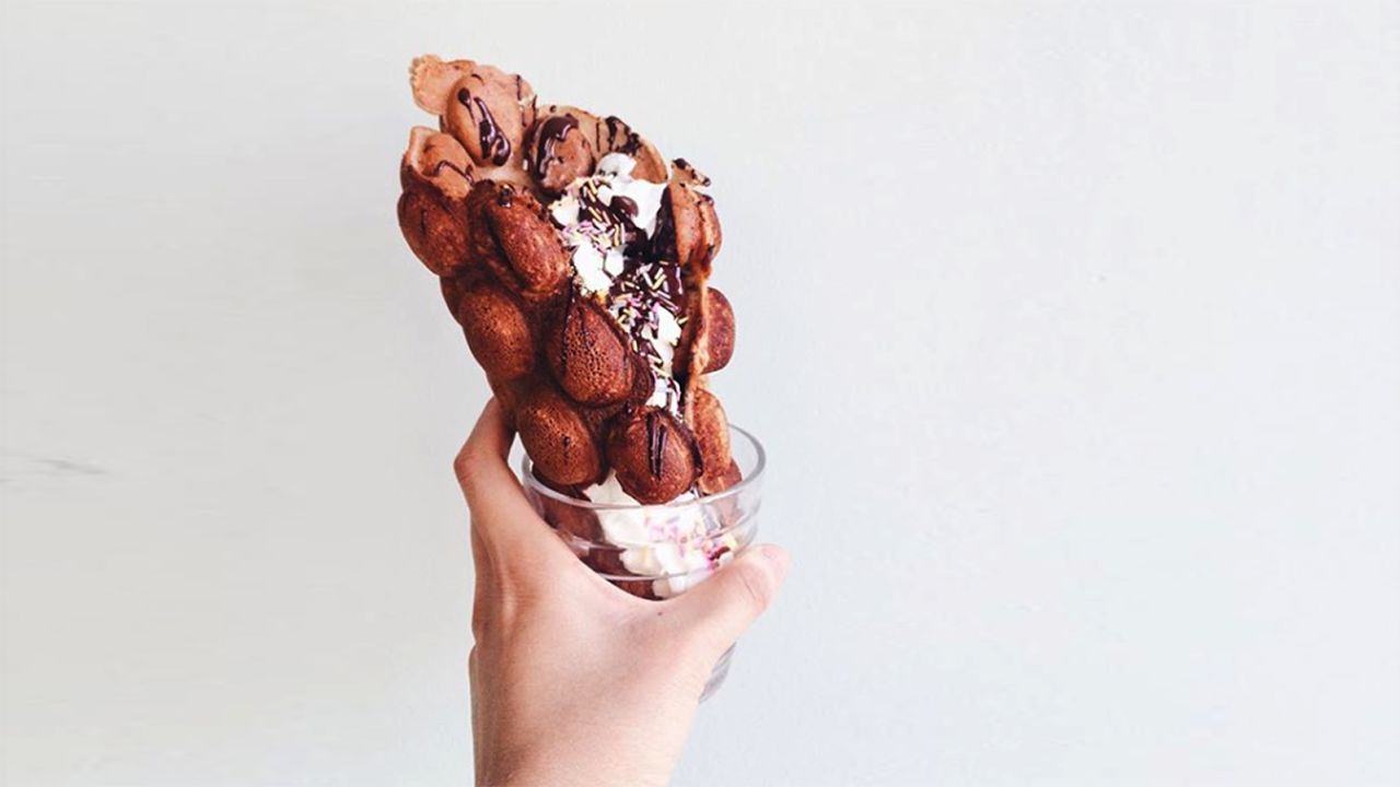 The new, evolved gai daan jai. The waffle is curled into a cone and filled with ice cream or whipped cream. 