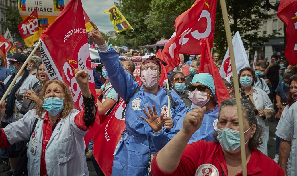 Health-care workers and union members demonstrate during a Bastille Day protest in Paris on July 14. <a href="https://www.npr.org/sections/coronavirus-live-updates/2020/07/14/890721869/french-health-care-workers-given-a-raise-honored-on-bastille-day" target="_blank" target="_blank">France is giving health-care workers a raise</a> for their efforts to fight the novel coronavirus.