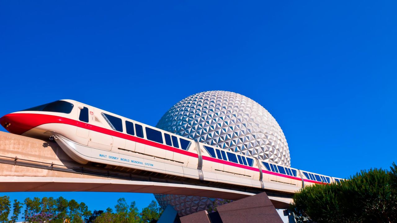 Monorail with Spaceship Earth (geosphere) in background, Epcot, Walt Disney World, Orlando, Florida USA