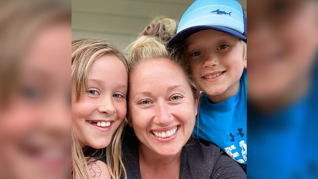 Brittany McMillan (center) and family as they look into the screen to connect with Abdul Razak Issah's family in Ghana. Jonah (right), is pals with Zul-Kifl Issah.