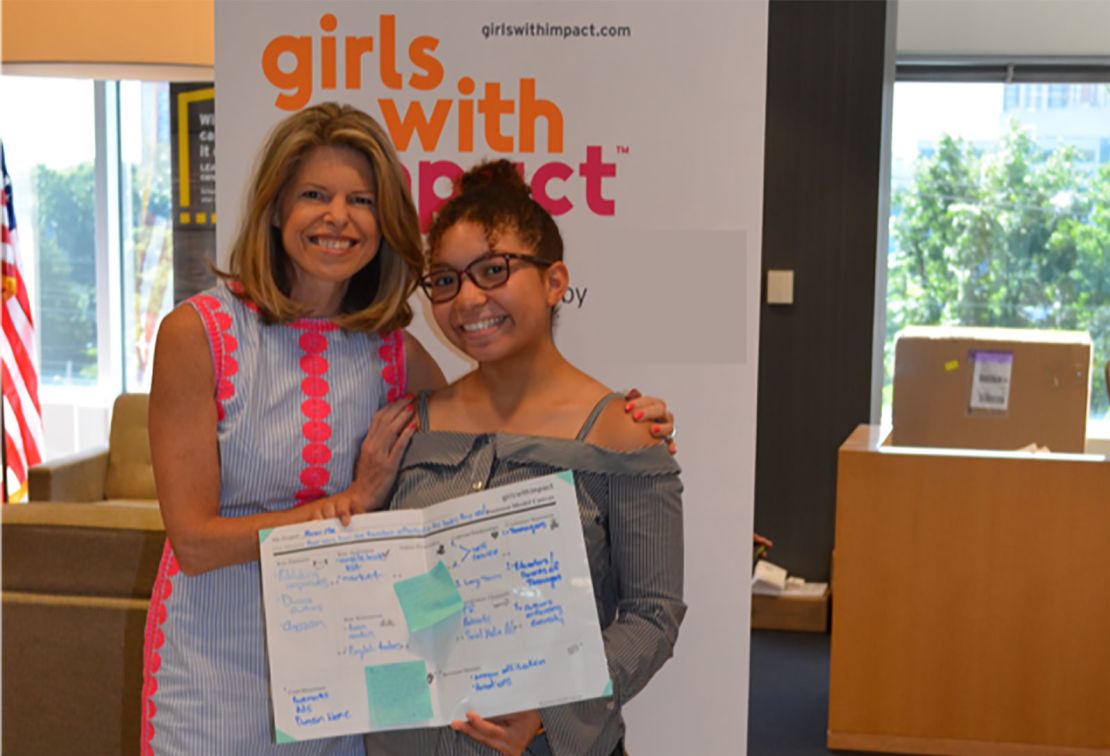 Girls With Impact CEO Jennifer Openshaw with Kristen St. Louis, 17, of the Bronx, New York, who founded Mirror Me Diversity, a program to distribute diverse books to classrooms countrywide.