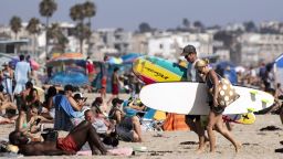 Mandatory Credit: Photo by ETIENNE LAURENT/EPA-EFE/Shutterstock (10708971m)A view of people at Venice Beach during a heatwave amid the coronavirus pandemic, in Los Angeles, California, USA, 11 July 2020.Heatwave in Los Angeles, California, USA - 11 Jul 2020