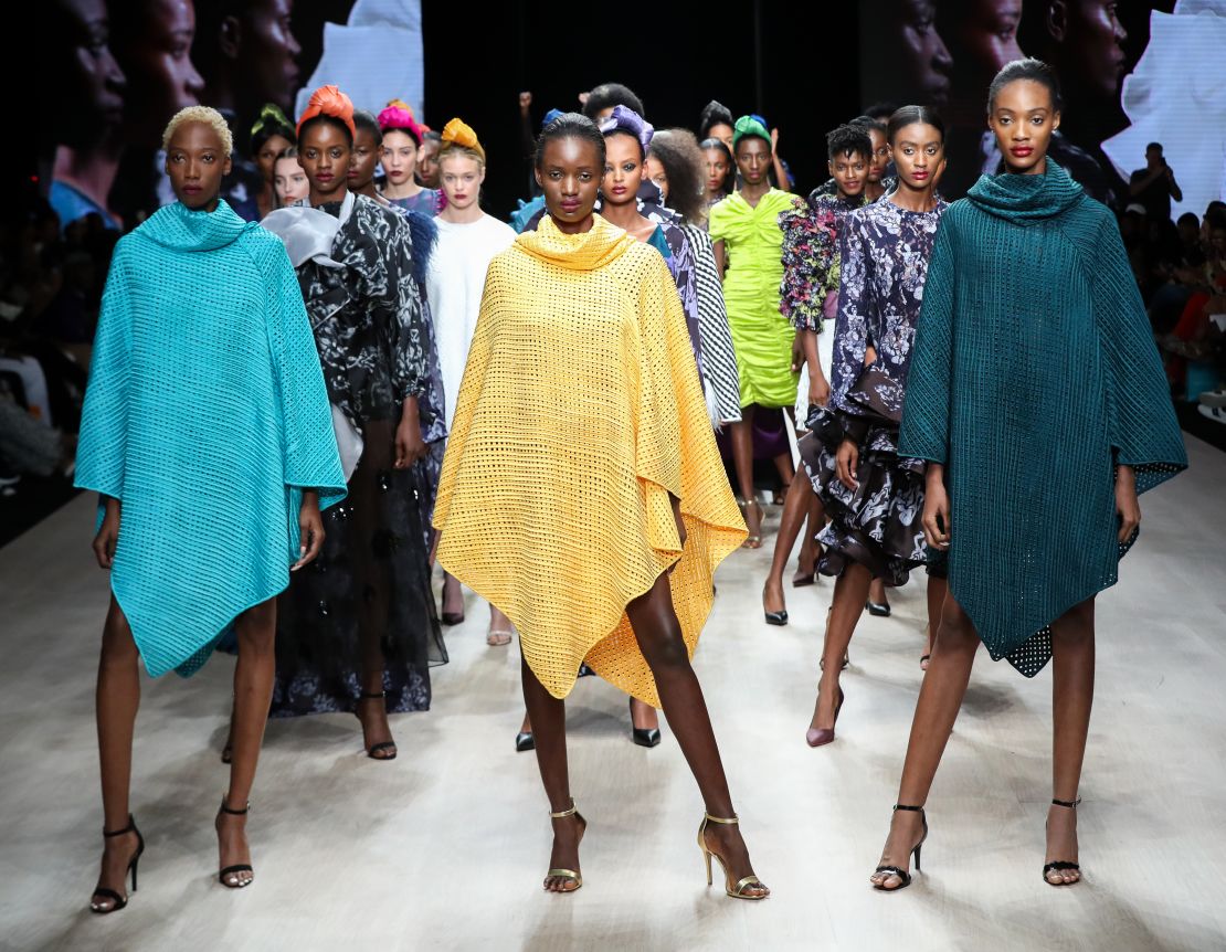 The colorful garments of the Tiffany Amber fashion line, seen here during Arise Fashion week in 2019, have since been replaced in production by PPE to help during the pandemic.