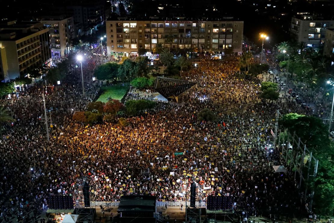 Israelis take part in a demonstration in Rabin Square in Tel Aviv on Saturday, as the country's economic situation deteriorates during the pandemic.