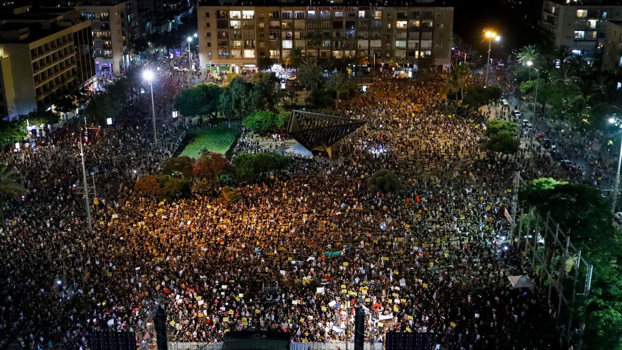 Israelis take part in a demonstration in Rabin Square in Tel Aviv on Saturday, as the country's economic situation deteriorates during the pandemic.