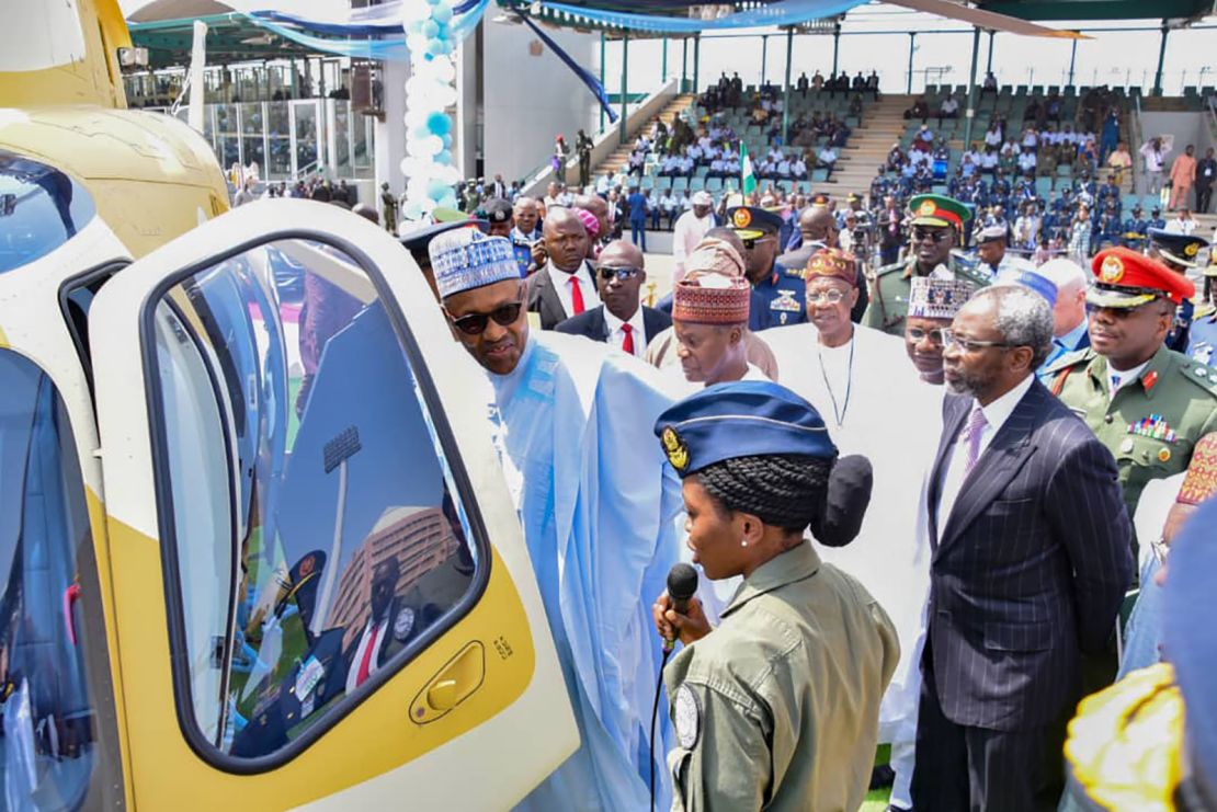  Arotile pictured with President Muhammadu Buhari.