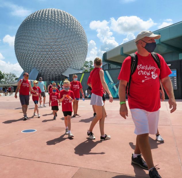Guests arrive at Disney's Epcot park in Lake Buena Vista, Florida, on July 15. <a href="https://www.cnn.com/travel/article/disney-world-epcot-reopens/index.html" target="_blank">The park was reopening,</a> as was Hollywood Studios, for the first time since March 15.