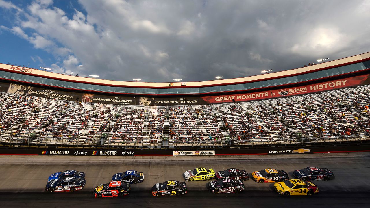 Drivers race by a reduced crowd during the NASCAR Cup Series All-Star Open at Bristol Motor Speedway in Bristol, Tennessee, on Wednesday, July 15.