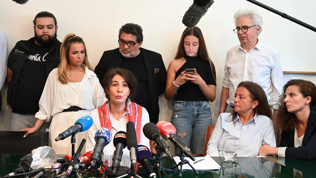Doria Chouviat, center, the widow of Cedric Chouviat, speaks during a press conference in Paris, on June 23, 2020. 