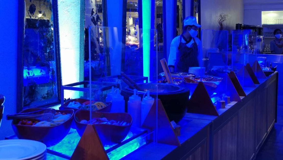 Buffet dinners are still happening at Anantara, but with a few changes in place. Food is laid out behind plexiglass barriers and stations are manned by staff. 