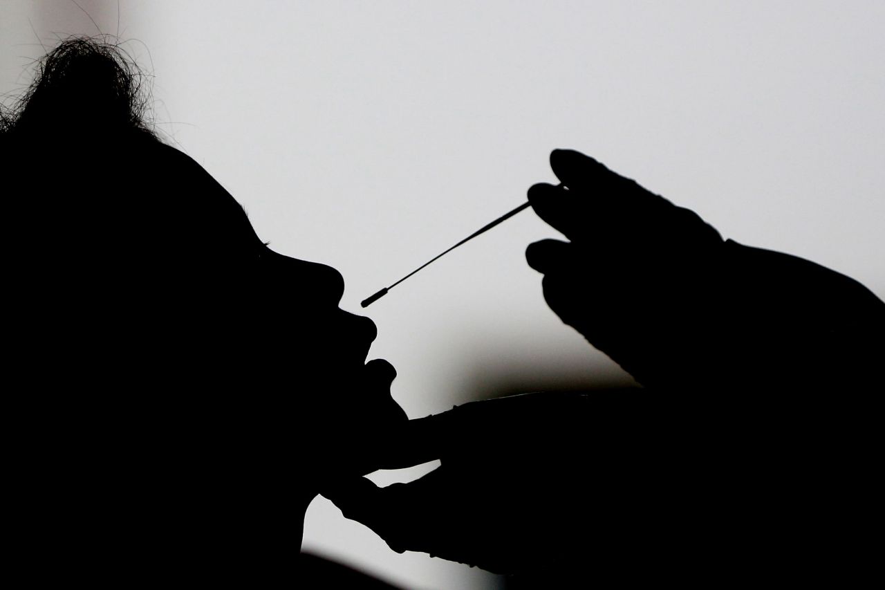 A person is tested for Covid-19 at a quarantine facility in Yangon, Myanmar, on Thursday, July 16.