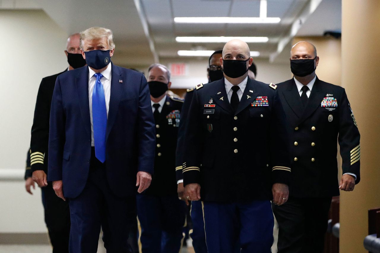 US President Donald Trump wears a face mask Saturday, July 11, as <a href="https://www.cnn.com/2020/07/11/politics/trump-walter-reed-visit-mask/index.html" target="_blank">he visits the Walter Reed National Military Medical Center</a> in Bethesda, Maryland. This is the first time since the pandemic began that the White House press corps got a glimpse of Trump with a face covering.