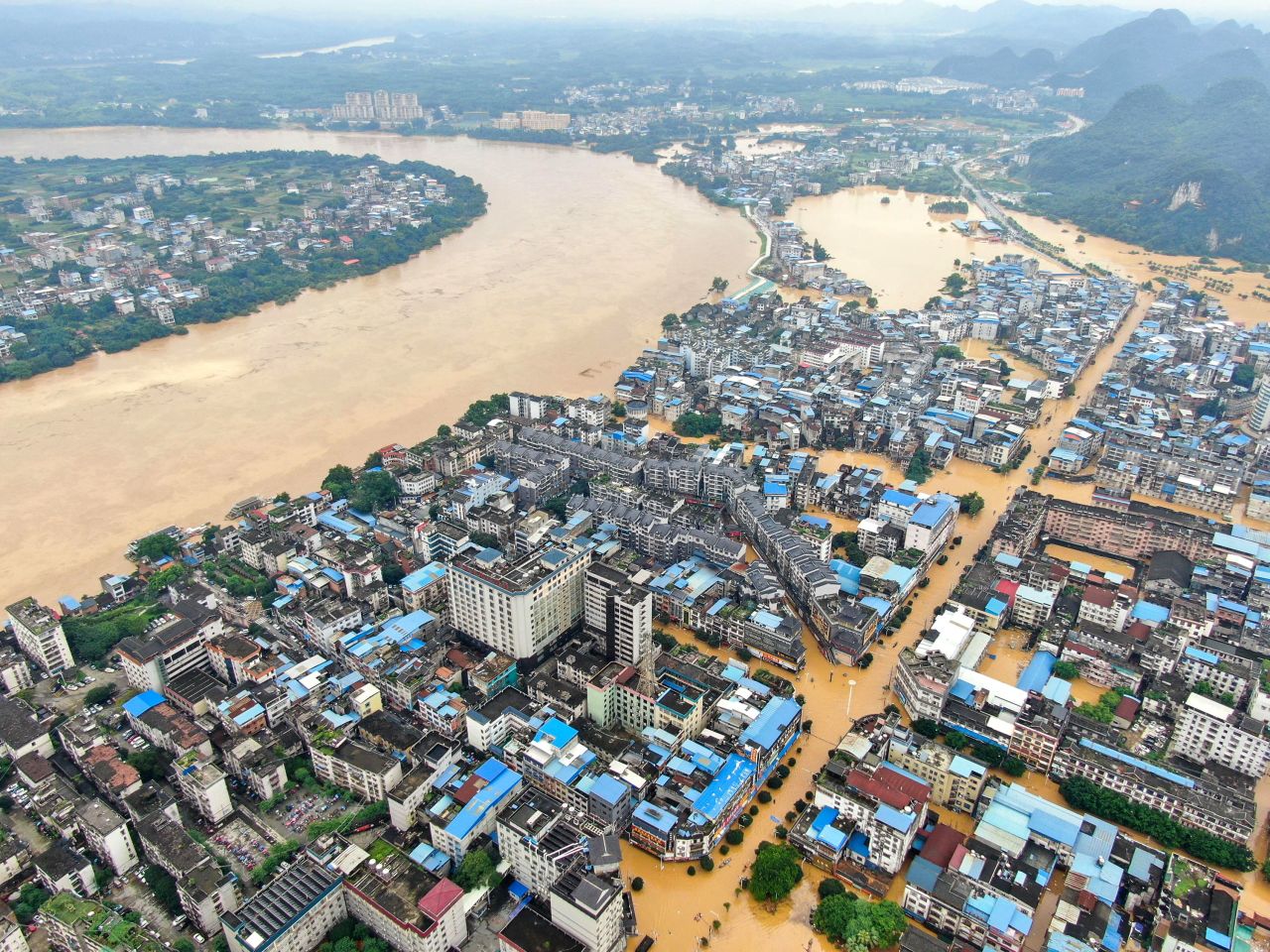 Buildings in Rongshui, China, are submerged by floodwaters on Saturday, July 11. Weeks of torrential rains have caused <a href="https://www.cnn.com/2020/07/14/asia/china-flood-coronavirus-intl-hnk/index.html" target="_blank">China's worst flooding in decades.</a>