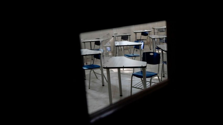 Picture of desks with acrylic shields put as a preventive measure against the spread of the novel coronavirus, COVID-19, at a Motolinia school classroom in Mexico City, on July 15, 2020, ahead of the reopening of educational facilities.