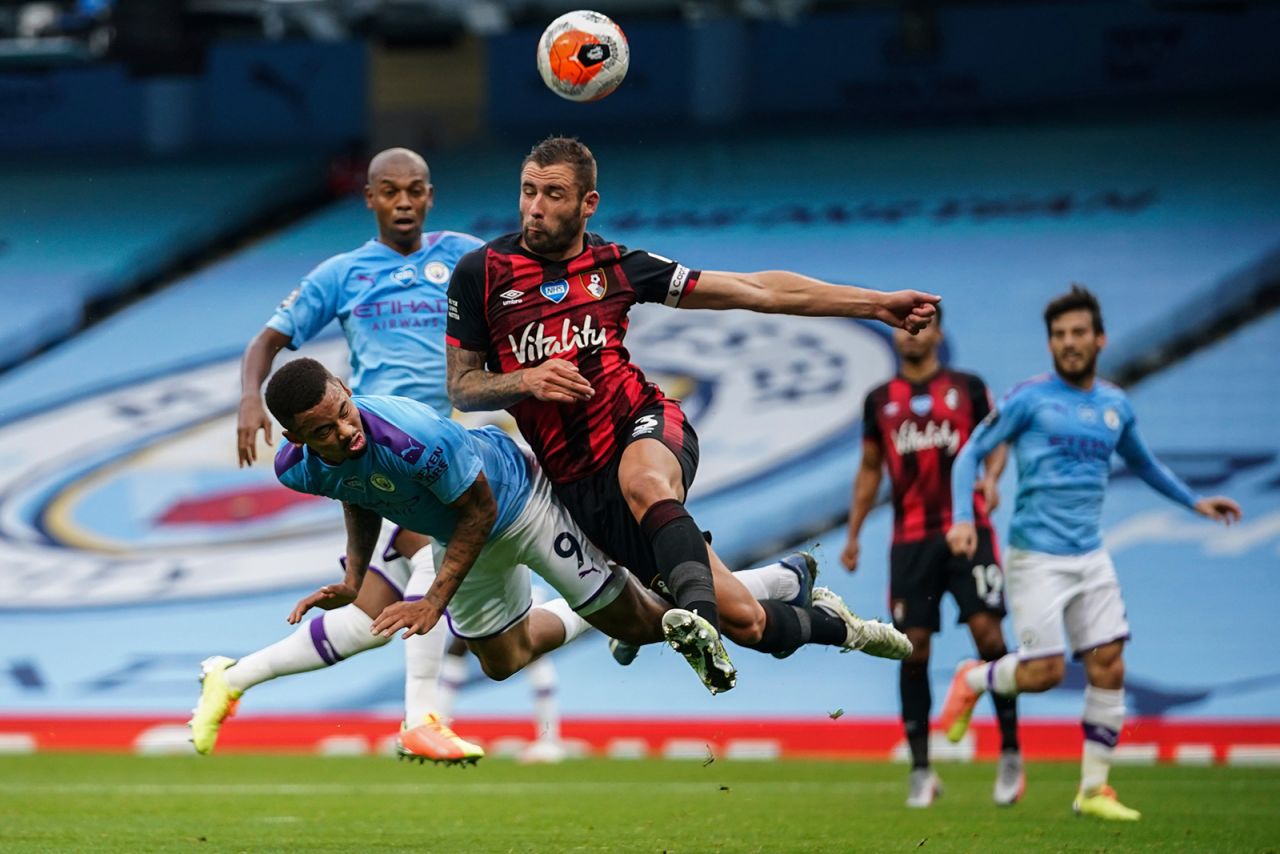 Bournemouth's Steve Cook, right, collides with Manchester City's Gabriel Jesus during a Premier League match in Manchester, England, on Wednesday, July 15.