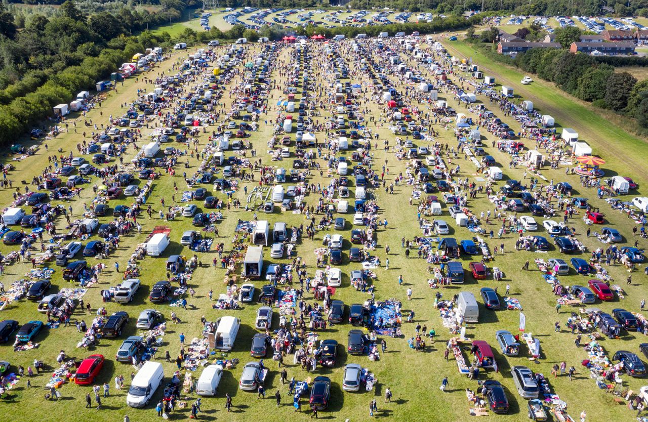 The Denham Giant Car Boot Sale takes place in Denham, England, on Saturday, July 11. It's a flea market where people sell goods from the trunks of their vehicles.