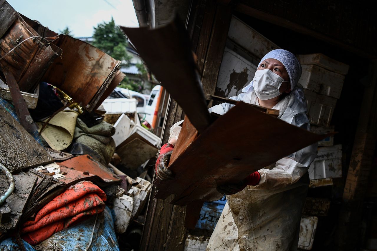 A resident clears debris from a home in Hitoyoshi, Japan, on Friday, July 10. <a href="https://www.cnn.com/2018/07/10/asia/japan-floods-intl/index.html" target="_blank">Landslides and flooding caused by torrential rain</a> have killed at least 200 people in what has become one of the deadliest natural disasters to hit Japan since the earthquake and tsunami of 2011.