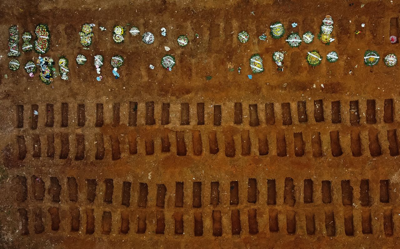 Open graves are prepared Thursday, July 16, at the Vila Formosa cemetery in Sao Paulo, Brazil. Only the United States has more confirmed coronavirus cases than Brazil, <a href="https://www.cnn.com/2020/05/22/americas/gallery/brazil-coronavirus/index.html" target="_blank">Latin America's hardest-hit country. </a>