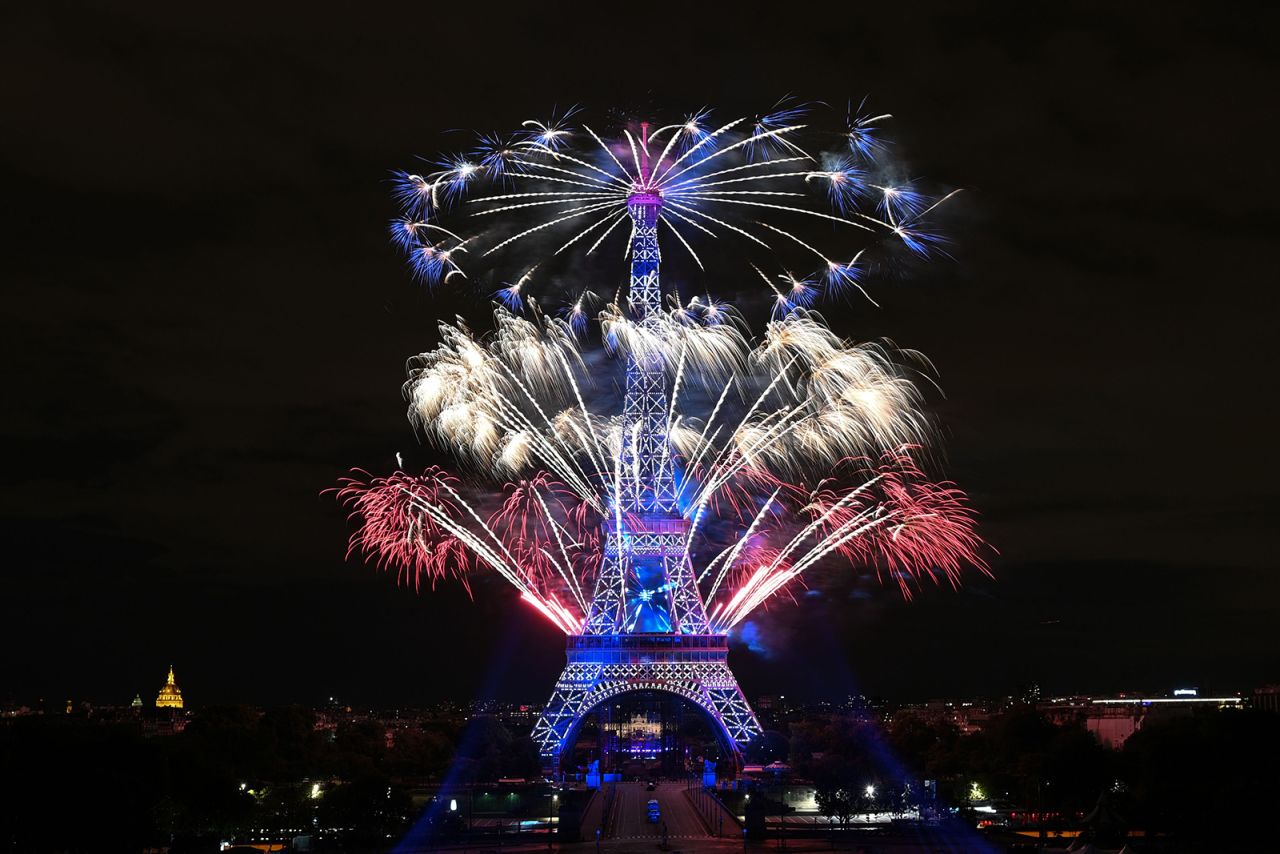 Fireworks explode over the Eiffel Tower during Bastille Day celebrations in Paris on Tuesday, July 14.
