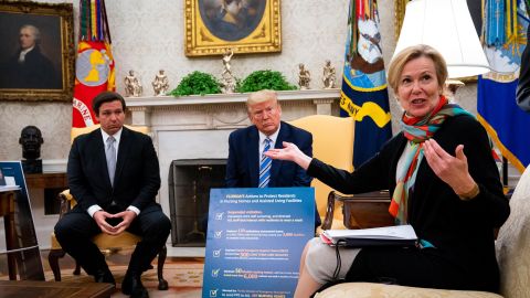 Dr. Birx answers a question while meeting with Florida Gov. Ron DeSantis and President Donald Trump in the Oval Office on April 28.