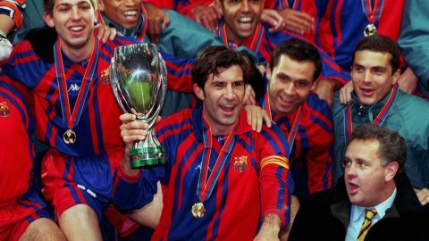 Figo celebrates winning the Super Cup with Barcelona in 1998.